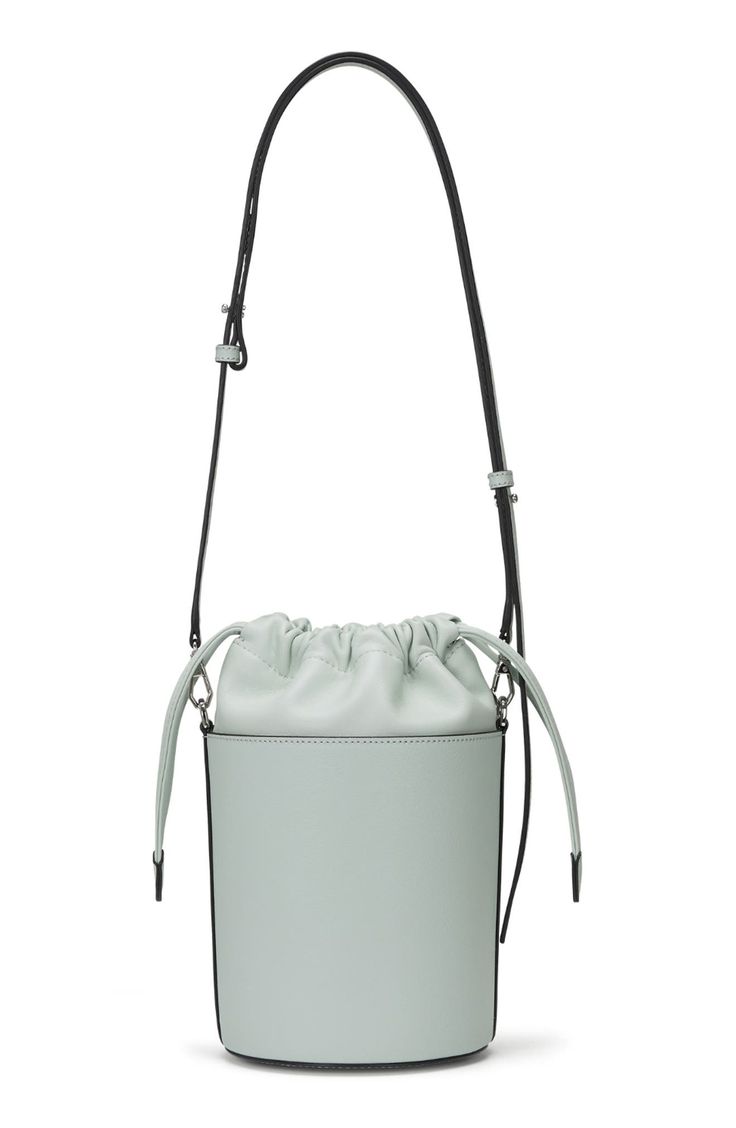 A scaled-down bucket bag with a modern silhouette is crafted of smooth leather offering optional wear with top carry handle or an adjustable, crossbody strap. 6"W x 9"H x 5"D 24" strap drop Drawstring closure Top carry handle; removable, adjustable crossbody strap Lined Leather Imported Spring Bucket Satchel With Adjustable Strap, Spring Bucket Bag With Detachable Strap For Errands, Modern Spring Bucket Bag With Top Handle, Modern Bucket Satchel For Errands, Modern Top Handle Bucket Bag For Errands, Modern Spring Bucket Bag With Top Carry Handle, Spring Bucket Bag With Removable Pouch For Errands, Modern Satchel With Adjustable Strap For Spring, Modern Crossbody Bucket Bag For Shopping