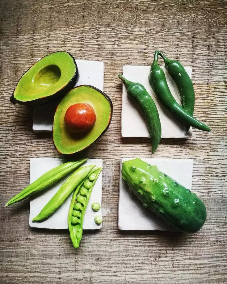 four different types of fruits and vegetables on cutting boards