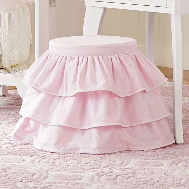 With sweet pink ruffles, this elegant vanity stool adds a whimsical feel to their space. KEY PRODUCT POINTS Upholstered Stool Base is made of upholstered plywood. Ruffled Stool Cushion Cover is made of 100% cotton with polyester fill. Stool and cushion cover are sold separately. All Pottery Barn Kids juvenile products are tested at 3rd party CPSC accredited labs to meet or exceed all industry voluntarily and regulatory safety requirements. Imported. Elegant Vanity, Stool Cushion, Upholstered Stool, Vanity Stool, Big Girl Rooms, Kitchen Collection, Pink Ruffle, Baby Furniture, My New Room