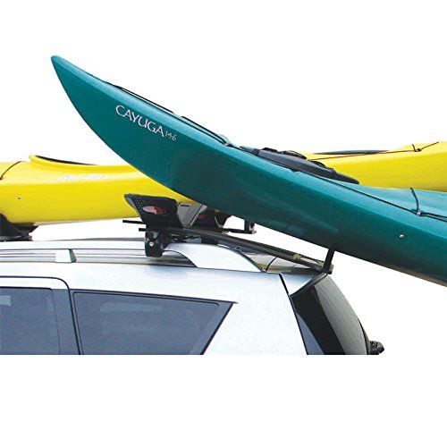 two kayaks are sitting on top of a car