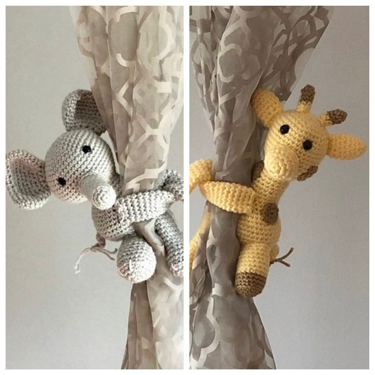 crocheted stuffed animals hanging from curtains