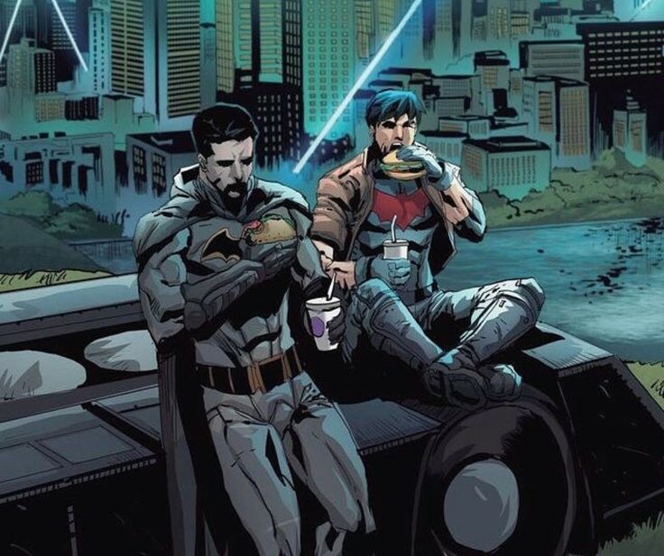 batman and robin wayne standing next to each other in front of a cityscape