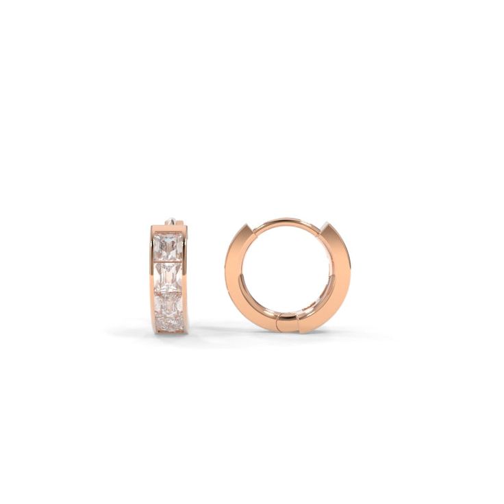 Our Arden Huggies are a bold new design featuring square french-cut lab grown diamonds. Specifications 8mm: 0.40ctw (each earring) 10mm: 0.51ctw (each earring) Lab grown diamond quality: D-F color, VS1-2 clarity 18k Recycled Gold Hinge Closure High Polish or Matte polishing finish Optional Black Rhodium finish If you are interested in supporting 18k Eco Fairmined Gold in our Lifestyle Pieces, contact our design team. Luxury Cubic Zirconia Channel Set Earrings, Luxury Cubic Zirconia Diamond Earrings Channel Set, Rose Gold Brilliant Cut Cubic Zirconia Huggie Earrings, Timeless Diamond Cut Huggie Earrings For Formal Occasions, Formal Cubic Zirconia Huggie Earrings With Halo Design, Elegant Baguette Cut Huggie Earrings For Everyday, Classic Baguette Cut Huggie Earrings As Gift, Classic Baguette Cut Huggie Earrings For Gifts, Luxury Cubic Zirconia Round Cut Huggie Earrings