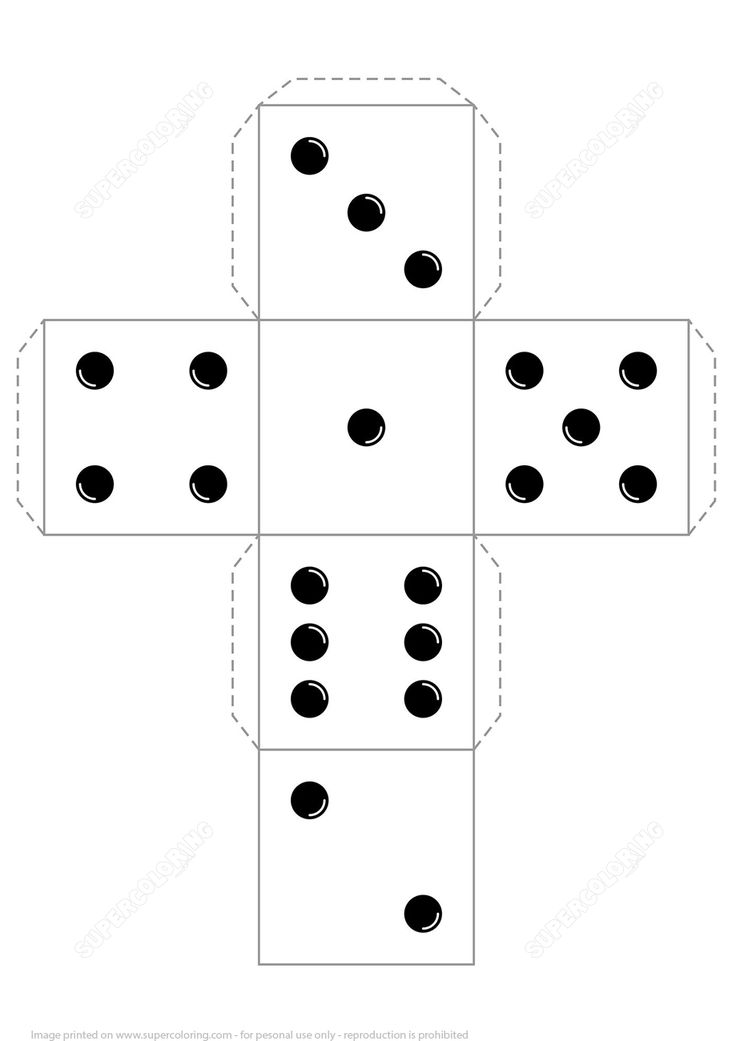 an open box with four dices cut out to make it look like they are in the