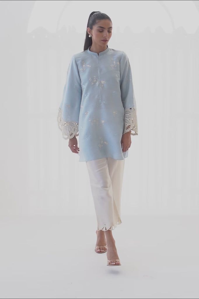 Spring Kurta With Embroidered Cuffs And Long Sleeves, Spring Long Sleeve Kurta With Embroidered Cuffs, Elegant Cotton Sets With Embroidered Cuffs, Elegant Festive Kurta With Embroidered Hem, Elegant Tops With Embroidered Cuffs, Elegant Cotton Blouse With Embroidered Cuffs, Elegant Blouse With Embroidered Cuffs, Elegant Embroidered Sets For Eid, Elegant Sets With Embroidered Hem For Eid