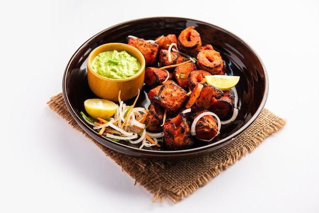 a bowl filled with food on top of a table