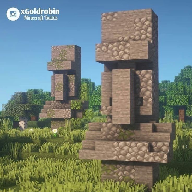 an image of some rocks and grass in minecraft