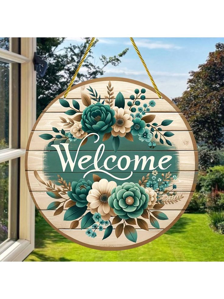 a welcome sign hanging from the side of a window