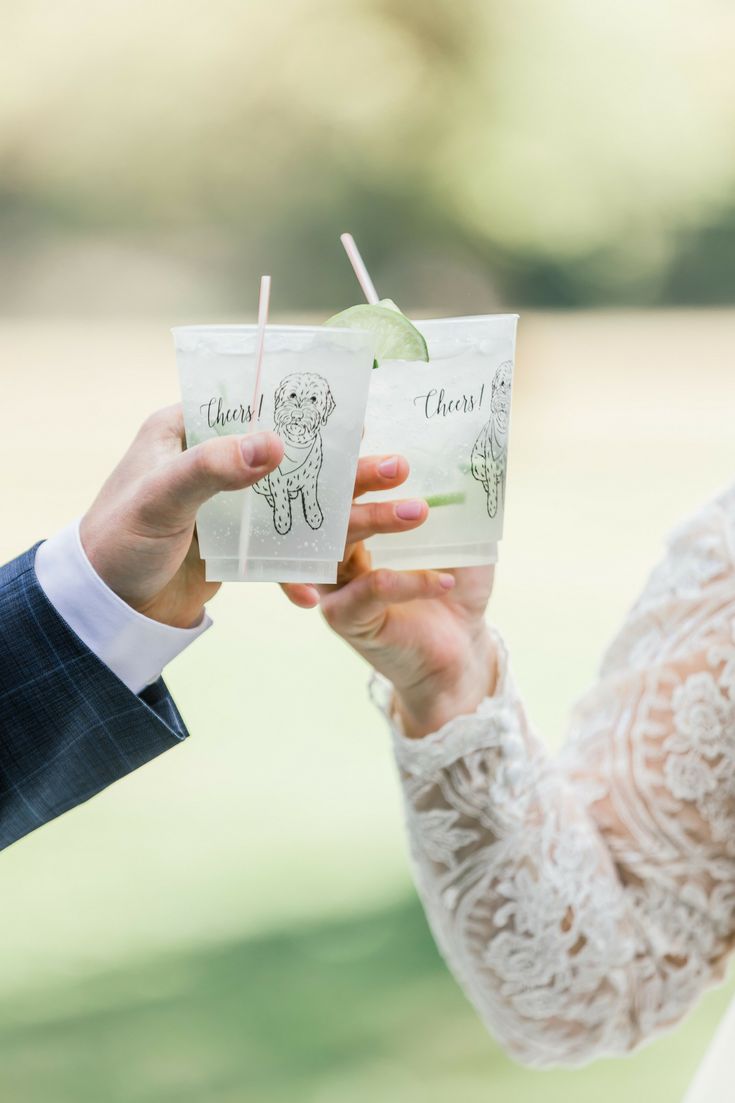 the bride and groom are exchanging their wedding vows