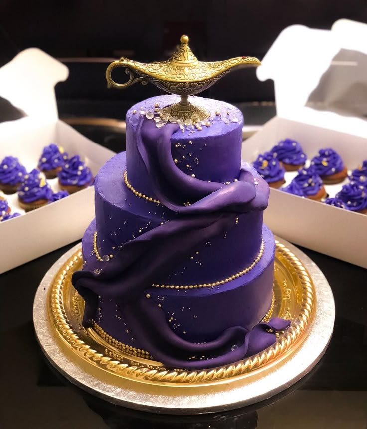 a purple cake sitting on top of a gold plate