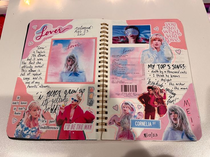 an open notebook with pictures and words on it