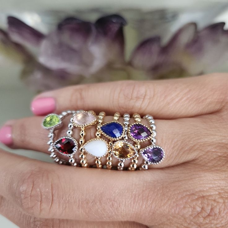 WOW TO THESE GORGEOUS STACKABLE RINGS!  WEAR FROM DAY TO NIGHT WITH ANY OUTFIT! -14K Gold -Natural Gemstone (Topaz Citrine Amethyst Peridot Garnet Turquoise Opal Onyx Agate Malachite) -Pear Shape Beaded Band Ring -7x5mm Pear shape center Natural Gemstone (Approx 0.70cts) -Bezel set stone -Perfect for stacking -Sizing Bar on Shank -Standard Size 7 (all other sizes can be special ordered with approximately 3-6 weeks delivery) Please make sure to add your ring size during Checkout -Priced in stores for $975  Your price is $485! WOW What a Deal -Perfect Gift Idea, comes with gift pouch Shop with confidence- we have been in the fine jewelry industry for over 30 years, and we're excited to launch our pieces on the Etsy platform. We offer 14 day return policy for a full refund as long as tags are Yellow Gold Multi-stone Gemstones In Sterling Silver, Fine Jewelry Pear-shaped Birthstone Ring, Dainty Sterling Silver Gemstones With Accents, Teardrop Birthstone Gemstones For Anniversary, Natural Gemstones For Anniversary, Teardrop Anniversary Birthstone Gemstones, Fine Jewelry Stackable Gemstones As Gifts, Fine Jewelry Stackable Teardrop, Sterling Silver Teardrop Birthstone Gemstones