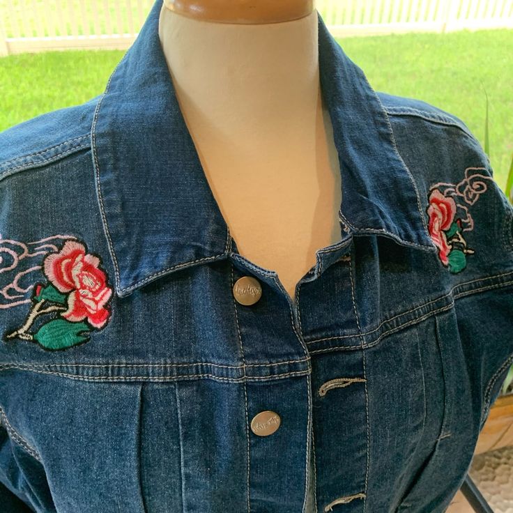 Blue Desire Denim Jean Jacket Nwot Mint Condition Gorgeous Embroidery Embellishes The Front Button Front Closure Sleeves Shoulder Seam To Cuff 24” You Will Look Amazing In This Well Designed Jacket. Will Be Shipped With In Two Days Of Purchase And Packaged With Care. Thank You For Shopping With Me. Casual Denim Vest With Floral Embroidery For Spring, Casual Embroidered Denim Vest For Spring, Casual Floral Embroidered Denim Vest For Spring, Embroidered Blue Button-up Denim Jacket, Embroidered Dark Wash Denim Jacket For Spring, Spring Embroidered Dark Wash Denim Jacket, Blue Embroidered Button-up Denim Jacket, Embroidered Denim Button-up Jacket For Spring, Embroidered Button-up Denim Jacket For Spring