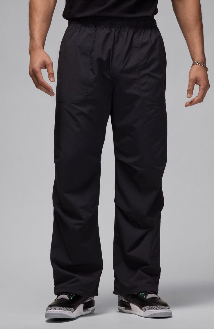 Roomy and relaxed, these all-activity pants made of lightweight nylon sport a trio of handy pockets and a go-anywhere-do-anything vibe. Elastic waist Front slant pockets; back welt pocket 100% nylon Machine wash, line dry Imported Moisture-wicking Nylon Techwear Bottoms, Waterproof Nylon Athleisure Bottoms, Black Nylon Activewear With Pockets, Functional Black Nylon Cargo Pants, Utility Nylon Parachute Pants For Sports, Black Nylon Functional Cargo Pants, Techwear Nylon Bottoms For Hiking, Urban Style Nylon Pants For Outdoor Activities, Waterproof Nylon Athleisure Pants