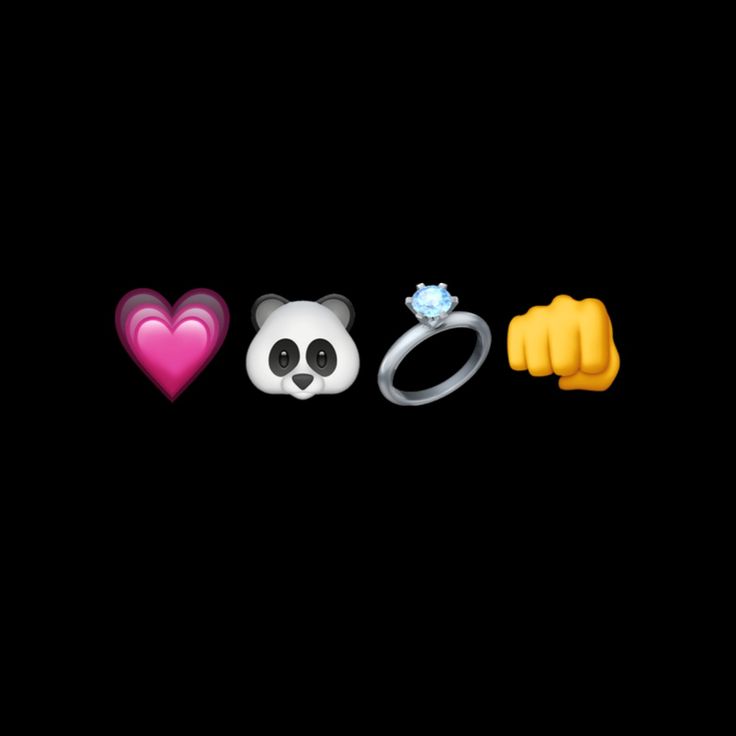 the panda bear ring is next to two other rings, one with a heart on it