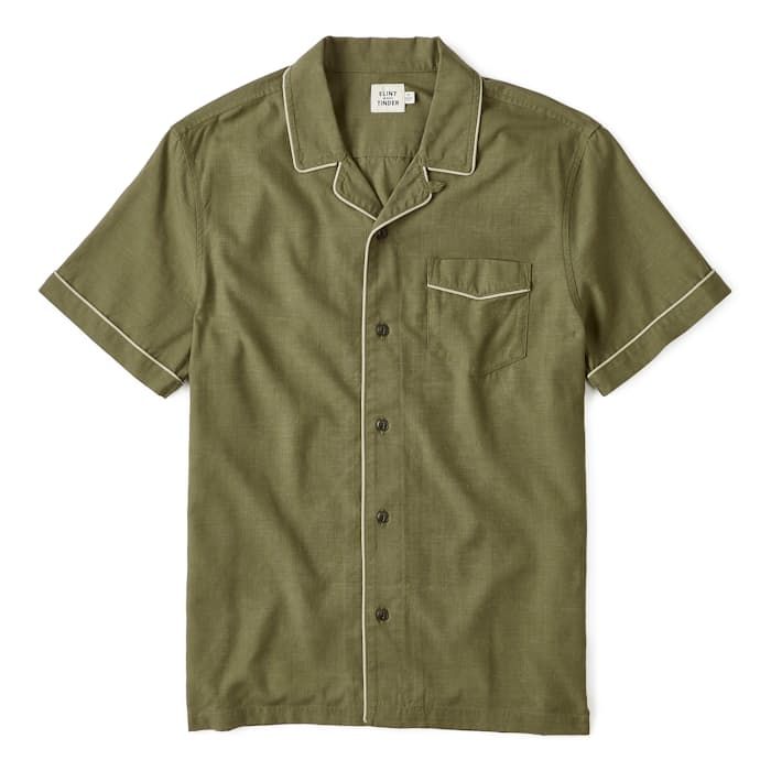 Breezy, relaxed camp collar shirt with stylish contrast piping Relaxed Fit Collared Top With Contrast Collar, Classic Collared Camp Shirt With Welt Pockets, Workwear Camp Shirt With Camp Collar, Collared Tops With Contrast Trim For Summer, Summer Collared Tops With Contrast Trim, Camp Shirt With Welt Pockets And Camp Collar, Casual Johnny Collar Top With Contrast Trim, Casual Tops With Johnny Collar And Contrast Trim, Classic Camp Shirt With Welt Pockets And Lapel Collar