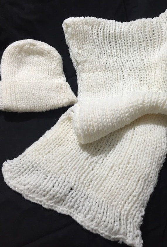 This super soft hand-knit hat and scarf can be worn by anyone.  100% acrylic means it is machine washable and dryable.  One size fits most.  Comes from a smoke free home.  Item will ship FREE (domestic only) USPS Priority Mail with Delivery Confirmation upon receipt of payment. Please email with questions. White Knitted Hats For Cold Weather, Handmade White Hats For Cold Weather, White Knitted Hat In Acrylic Yarn, White Knitted Acrylic Yarn Hat, White Acrylic Winter Hat, Hand Knitted White Beanie, Cozy White Knitted Hat, White Acrylic Yarn Hat One Size, White Casual Acrylic Beanie