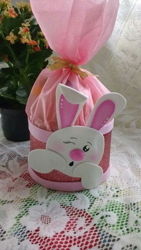 a pink basket with a bunny face on it