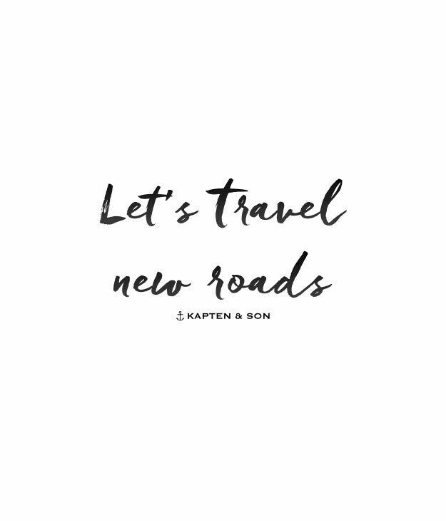 the words let's travel new roads written in black ink on a white background