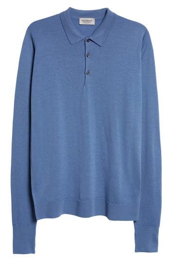 The English label's commitment to understated luxury informs the design of this supremely soft polo sweater crafted from extrafine merino wool. 28" length (size Medium) Button half-placket Spread collar Long sleeves 100% merino wool Dry clean or machine wash, dry flat Made in the UK Men's Designer Clothing Blue Polo Collar Sweater For Work, Blue Polo Sweater With Ribbed Collar For Work, Luxury Blue Sweater For Workwear, Luxury Blue Sweater For Work, Blue Polo Collar Sweater For Winter, Blue Collared Polo Sweater For Winter, Blue Polo Collar Sweater For Fall, Blue Polo Sweater For Fall, Blue Collared Polo Sweater For Fall