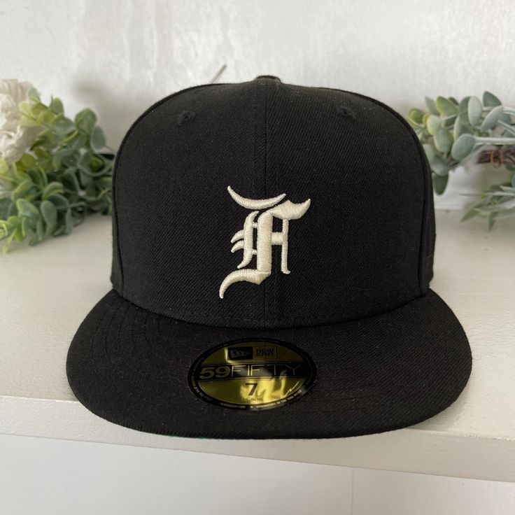 New! Size 7 Black Fitted Cap. Classic Fitted Hat For Streetwear, One Size, Classic Fitted Hat For Streetwear, Short Brim Hats With Embroidered Logo For Streetwear, Urban Black Fitted Hat For Baseball Season, Black Urban Fitted Hat For Baseball Season, Streetwear Hats With Embroidered Logo And Short Brim, Classic Black Dad Hat With Flat Brim, One Size Streetwear Fitted Hat With Short Brim, Classic Black Fitted Hat For Streetwear