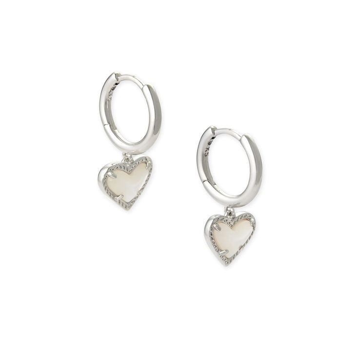 Hearts and huggies together - is there anything better? The Ari Heart Huggie adds that little something extra to your look with its playful asymmetrical design.CLOSURE Hinge SIZE 0.60â€ outside diameter, 0.43â€ L 0.40â€ W charm Please note: Due to the one-of-a-kind nature of the medium, exact colors and patterns may vary slightly from the image shown. Silver Huggie Earrings, Huggie Earrings Gold, Huggie Earring, Kendra Scott Necklace, Womens Earrings Studs, Pearl Pink, Kendra Scott Earrings, Huggie Earrings, Monogrammed Items