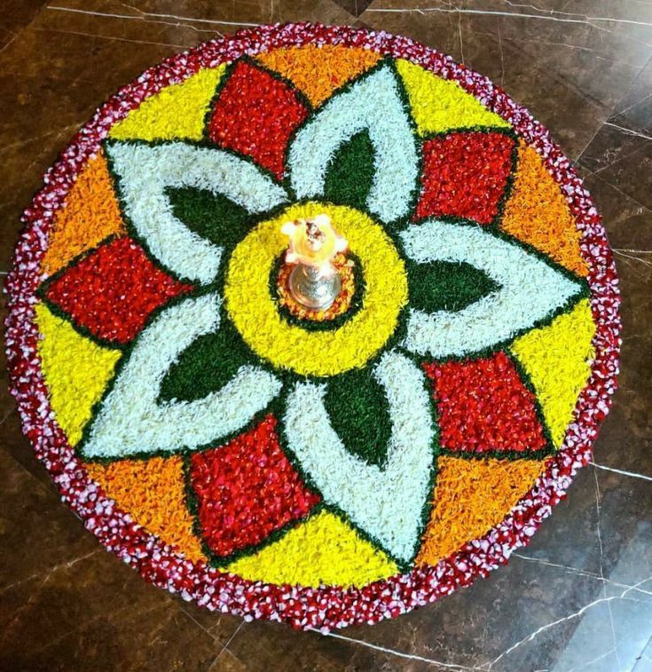 a colorful flower design is on the floor