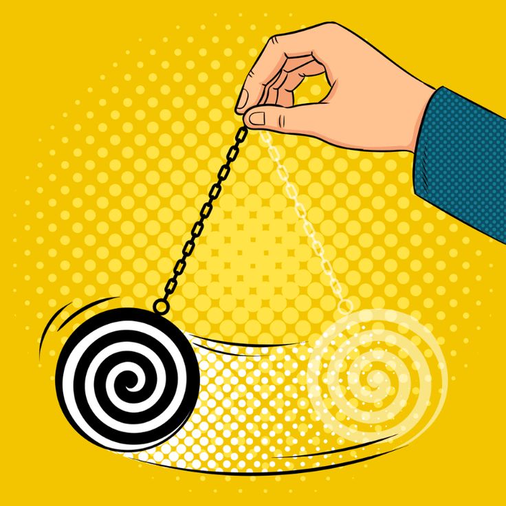 a hand holding a ball and chain with an arrow in the center on a yellow background