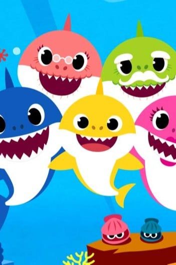 five cartoon sharks are swimming in the ocean with fish around them and one is smiling