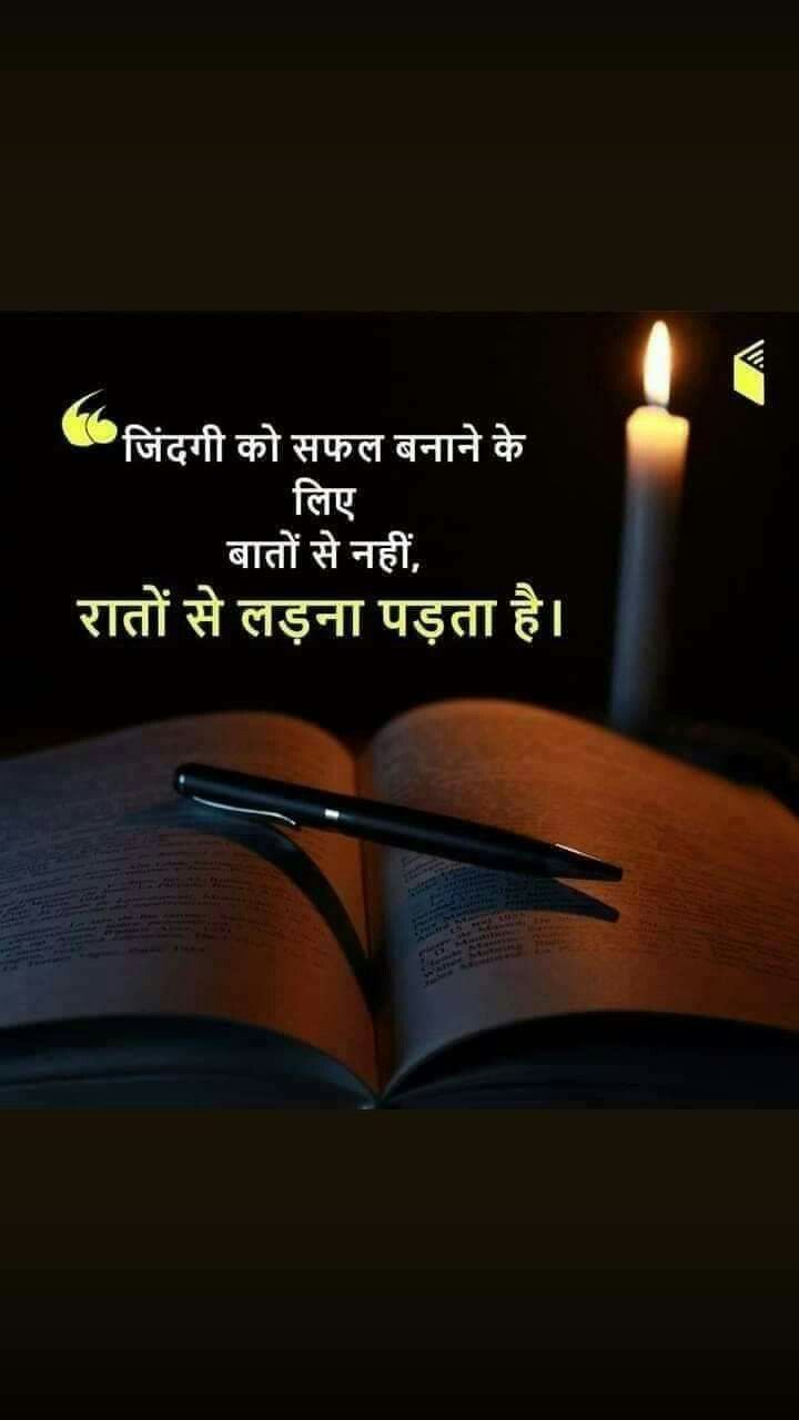 an open book with a lit candle on it and the caption in english is written