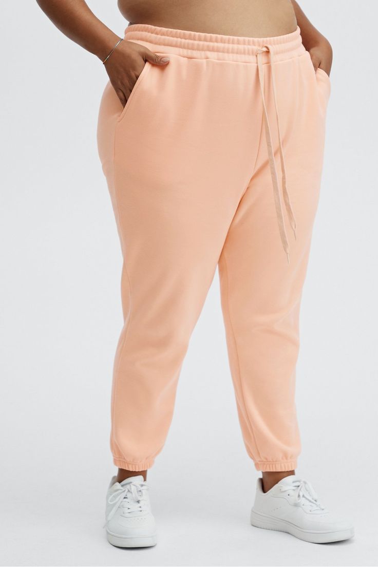 Eco Go-To Classic Sweatpant Fabletics pink female Activewear >> Womens >> Bottoms >> Pants & Joggers >> Joggers Fleece plus Lounge Pockets Classic style in Recycled Structured Fleece Click here to learn how we’re committed to keeping the earth in good shape. Pink Stretch Sweatpants For Loungewear, Pink Athleisure Joggers With Elastic Waistband, Pink Sweatpants With Elastic Waistband For Jogging, Pink Sweatpants With Pockets For Jogging, Pink Sweatpants For Spring Jogging, Comfortable Stretch Pink Sweatpants, Comfortable Pink Stretch Sweatpants, Pink Relaxed Fit Athleisure Pants, Pink Athleisure Bottoms For Loungewear