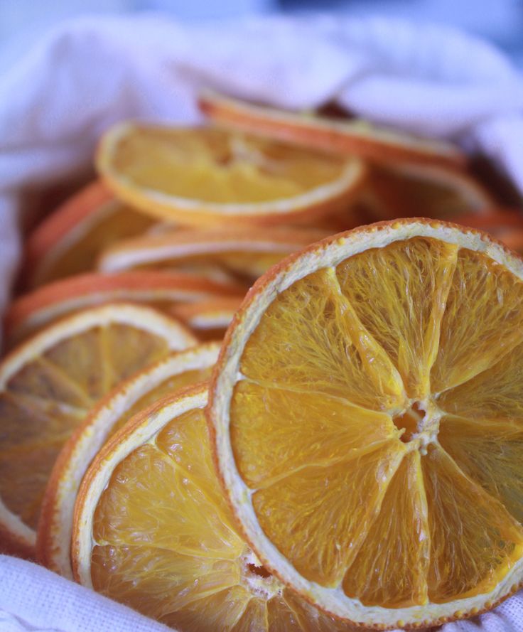 several orange slices are arranged in a basket