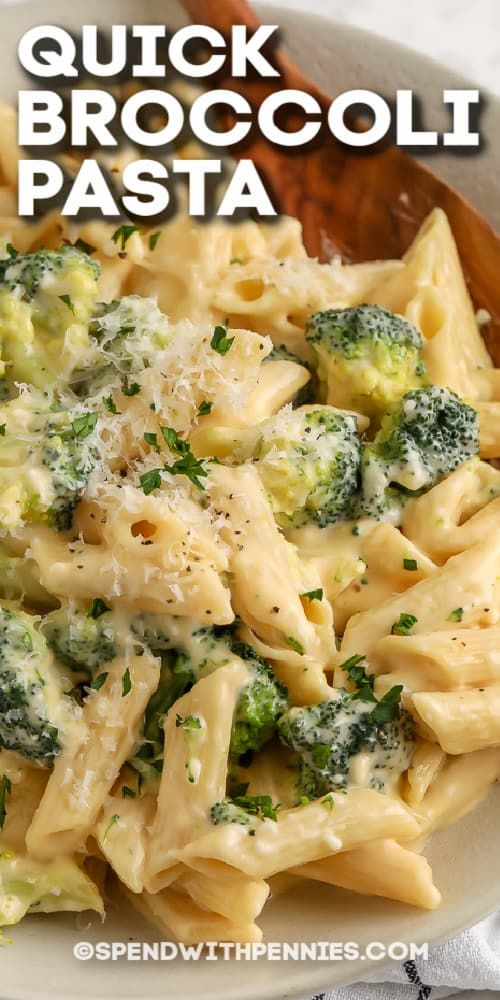 a pasta dish with broccoli and cheese on top