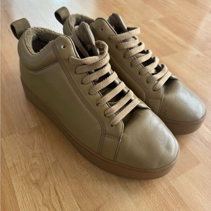 Used Bottega Veneta Tan/Brown Leather Sneakers In Excellent Condition! Includes Original Dust Bags And Box Beige Leather High-top Sneakers With Textured Sole, Brown Low-top Sneakers For Winter, Brown Mid-top Winter Sneakers, Brown Winter Sneakers With Textured Sole, Khaki Round Toe Sneakers For Fall, Fall Khaki Sneakers With Round Toe, Cream Leather High-top Sneakers With Round Toe, Brown Slip-on Winter Sneakers, Winter Brown Cushioned Sneakers