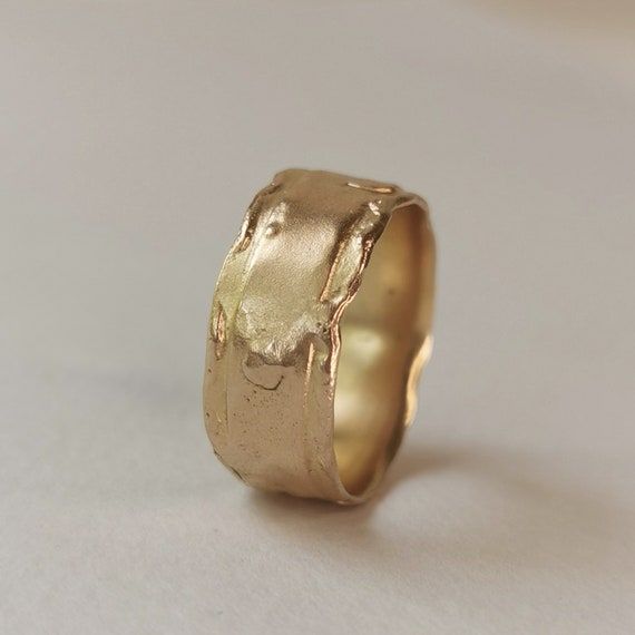 Unique Hammered Rings In Recycled Gold, Handmade Anniversary Ring With Thick Band, Handmade Thick Band Jewelry As Gift, Artisan Untreated Wedding Jewelry, Artisan Untreated Jewelry For Wedding, Minimalist Hand Cast Wedding Jewelry, Minimalist Hand-cast Wedding Jewelry, Hand Cast 14k Gold Wedding Rings, 14k Gold Hand Cast Wedding Rings