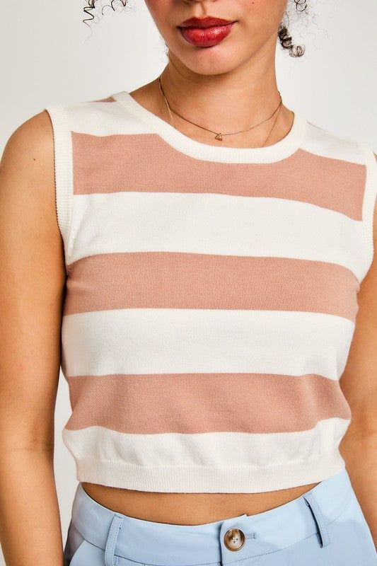 Sleeveless striped sweater top Available in ivory and beige and blue and cream Sizes XS-L Fabric: 50% rayon, 28% nylon, 22% polyester White Sleeveless Top With Vertical Stripes, Chic Striped Sweater Vest For Spring, Chic Cream Sweater Vest For Spring, White Sleeveless Tank Top With Contrast Stripes, Beige Tops With Vertical Stripes For Summer, White Tops With Contrast Stripes For Layering, Striped Sleeveless Top For Layering, Sleeveless Striped Tops For Layering, Chic Cream Knit Tank Top