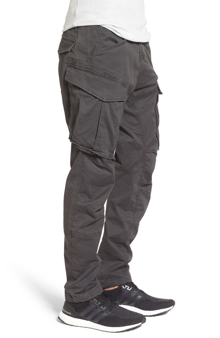 Stretch-cotton pants in a tapered profile rock a modern, utilitarian look with cargo-style pockets and ergonomic seaming for a more active fit. 32" inseam; 14" leg opening; 10" front rise; 15" back rise (size 32) Zip fly with button closure Side slant pockets; back flap pockets; side cargo pockets 97% cotton, 3% elastane Machine wash, dry flat Imported Fitted Cargo Pants With Patch Pockets For Streetwear, Cotton Combat Cargo Pants With Hip Pockets, Functional Straight Leg Cargo Pants, Cotton Cargo Jeans For Outdoor Activities, Combat Style Straight Leg Cargo Jeans With Side Pockets, Cotton Combat Cargo Jeans With Straight Leg, Utility Cargo Pants With Tapered Leg, Techwear Cargo Pants With Multiple Pockets, Functional Relaxed Fit Cargo Pants With Pockets