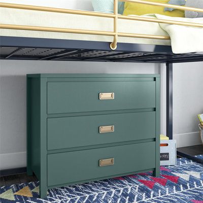 a green dresser under a bunk bed in a bedroom