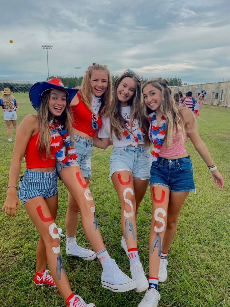 the girls are all wearing red, white and blue