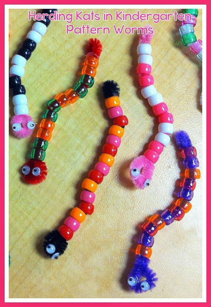 several different colored beads are arranged on a table with the words, helping kids in kindergart fun pattern worms