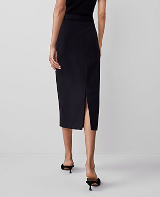 Elevate your wardrobe with the Ann Taylor Ponte Belted Midi Pencil Skirt, a piece that marries sophistication with comfort. This skirt is designed to flatter, featuring a sleek midi length and a streamlined silhouette that enhances your figure.

- Size: Regular - 6
- Color: Black
- Gender: Female
- Material: 66% Rayon, 30% Nylon, 4% Spandex
- Length: 32" long
- Features: Belt loops, self-tie buckle belt, hidden back zipper with hook-and-eye closure, back vent

Perfect for both office and evening Fitted Belted Midi Bottoms, Fitted Midi Length Belted Bottoms, Chic Pencil Skirt With Belt Loops For Work, Chic Pencil Skirt With Belt Loops, Chic Workwear Pencil Skirt With Belt Loops, Fitted Pencil Skirt With Belt Loops For Workwear, Workwear Pencil Skirt With Belt Loops, Office Pencil Skirt With Belt Loops, Minimalist Chic Fashion