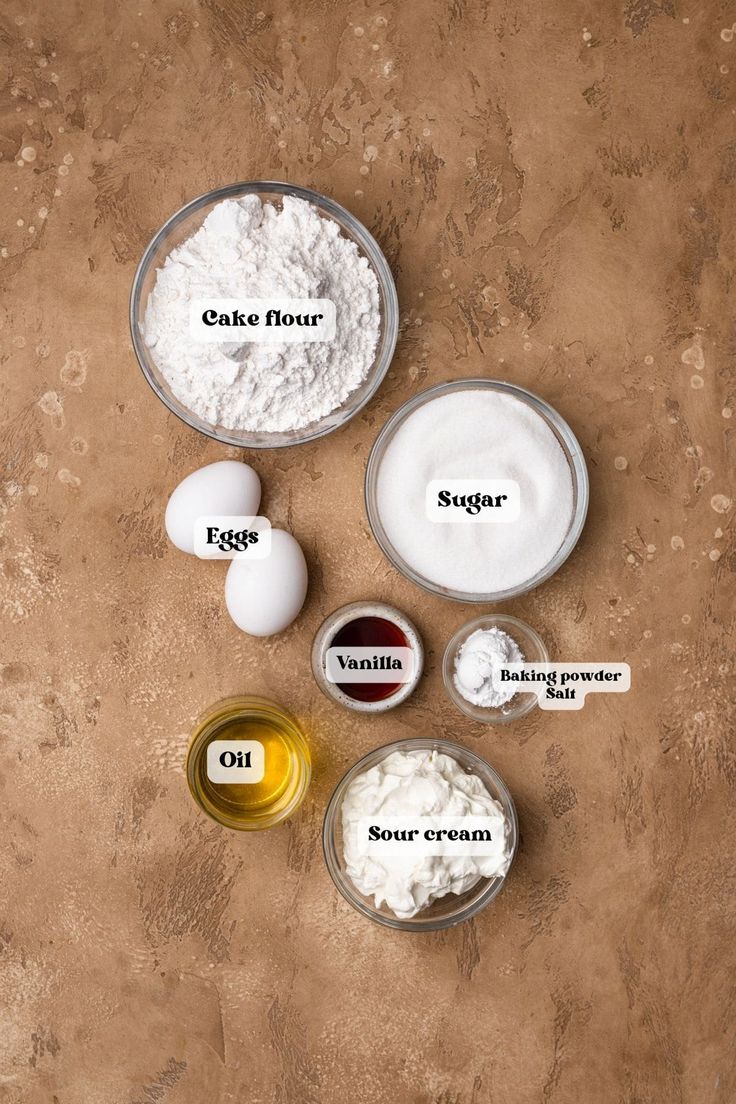 ingredients for cake flour laid out on a table