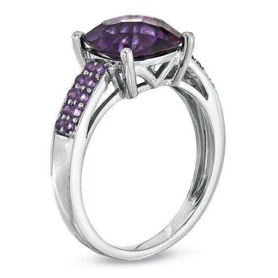 Wow the February-born birthday girl with a dazzling ring that's just her style! Fashioned in sleek sterling silver, the focus of this ring is the 9.0mm cushion-cut purple amethyst center stone that draws the eye. The band is lined with a double row of additional amethysts, adding an additional pop of color. Polished to a brilliant shine, this ring is certain to captivate and delight her. Custom made to fit her ring size. Sterling silver rings cannot be resized after purchase. Elegant Cushion Cut Amethyst Ring, Elegant Purple Cushion Cut Amethyst Ring, Purple Cushion Cut Fine Jewelry, Elegant Asscher Cut Purple Ring, Elegant Purple Asscher-cut Ring, Elegant Purple Asscher Cut Ring, Fine Jewelry Purple Cushion Cut Amethyst Ring, Fine Jewelry Cushion Cut Amethyst Ring, Modern Purple Amethyst Ring With Accent Stones