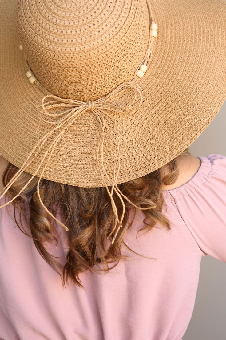 Block the rays in the most stylish of ways! Our BOHEMIAN hat comes in a natural tan woven texture. A straw beaded band tops off the look. Decorate your Summer outfits with a lightweight touch! Measurements: 4” Brim, 3.5” Crown Depth, 7.5” Head Diameter Material: 100% paper Casual Natural Hat Bands For Beach, Adjustable Natural Color Sun Hat For Day Out, Adjustable Natural Sun Hat For Day Out, Beige Straw Hat Band For Summer, Adjustable Beachy Straw Hat For Day Out, Bohemian Adjustable Sun Hat For Day Out, Casual Braided Hat Bands For Summer, Casual Beaded Straw Hat For Spring, Casual Beige Hat Bands For Vacation