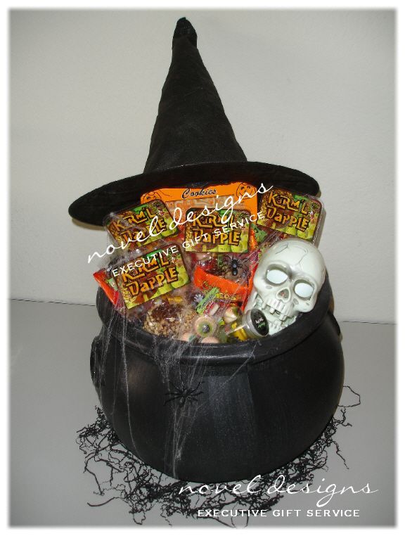 a witches hat filled with candy and candies