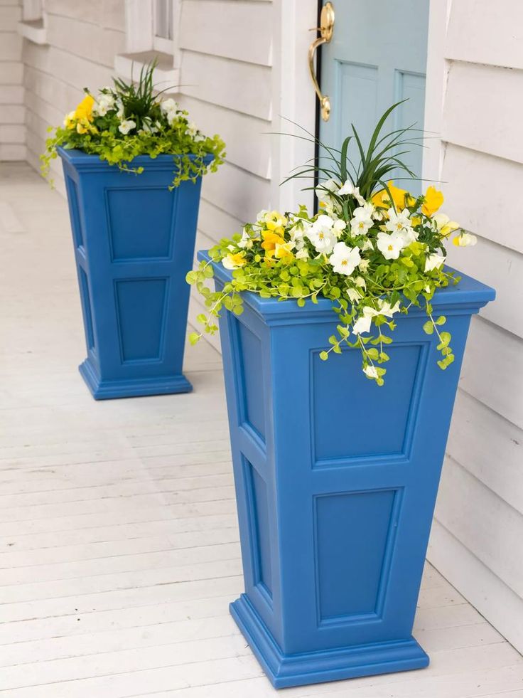 Dress up your landscape with these elegant, self-watering planters. They are rather tall planters at 28" high, adding some drama to your patio. With clean lines and raised panel detailing, they have the look of fine woodworking. But, unlike wooden planters these are virtually maintenance free because they're made from high quality polyethylene — there's no need for annual painting or staining. With the best UV protection in the industry, these planters have a 15-year guarantee against fading. Th Decorative Planters Outdoor, Tomato Planter, Wooden Garden Bed, Metal Raised Garden Beds, Trough Planters, Rose Seeds, Patio Planters, Gardens Design, Tall Planters