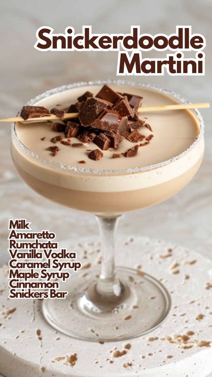 The Snickerdoodle Martini is a decadent cocktail that perfectly captures the flavors of the beloved cookie. Combining creamy Rumchata, sweet amaretto, and vanilla vodka, this drink is a delightful blend of cinnamon, caramel, and chocolate, making it an ideal treat for dessert or special occasions. #snickerdoodlemartini via @mybartender Amaretto Martini, Snickerdoodle Martini, Dessert Martinis, Martini Variations, Amaretto Recipes, Amaretto Cocktails, Rumchata Cocktails, Dessert Cocktails, Cocktail Cards