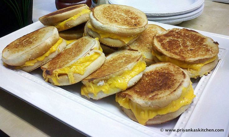 there are many sandwiches on the plate ready to be eaten at the restaurant or take out