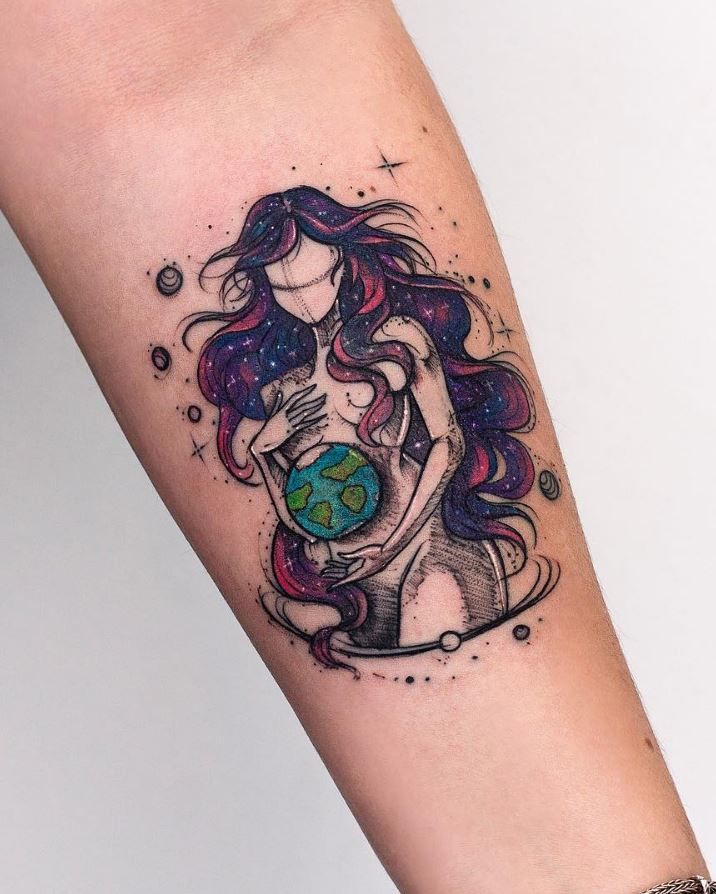 a woman with long hair holding a globe tattoo on her arm