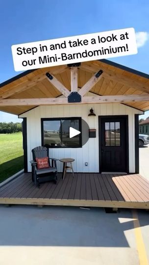 a tiny house with a porch on the side and a door that says, step in and take a look at our mini - barniumum